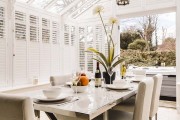 Dining table in conservatory Haviland self catering cottage