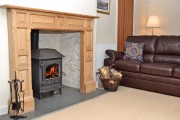 Lounge and fire at Rill House holiday accommodation