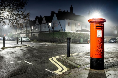 Enigmatic сombination of London fog and London red mailbox
