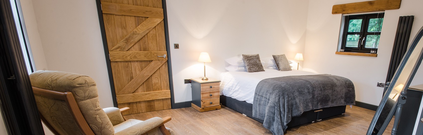 Spacious bedroom at The Stables self catering cottage. Photograph by THE STABLES